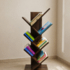 Tree Shaped Wooden Bookshelf Tree shaped wooden bookshelf with colorful books in a modern room